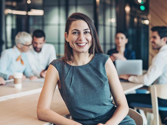 Woman in boardroom